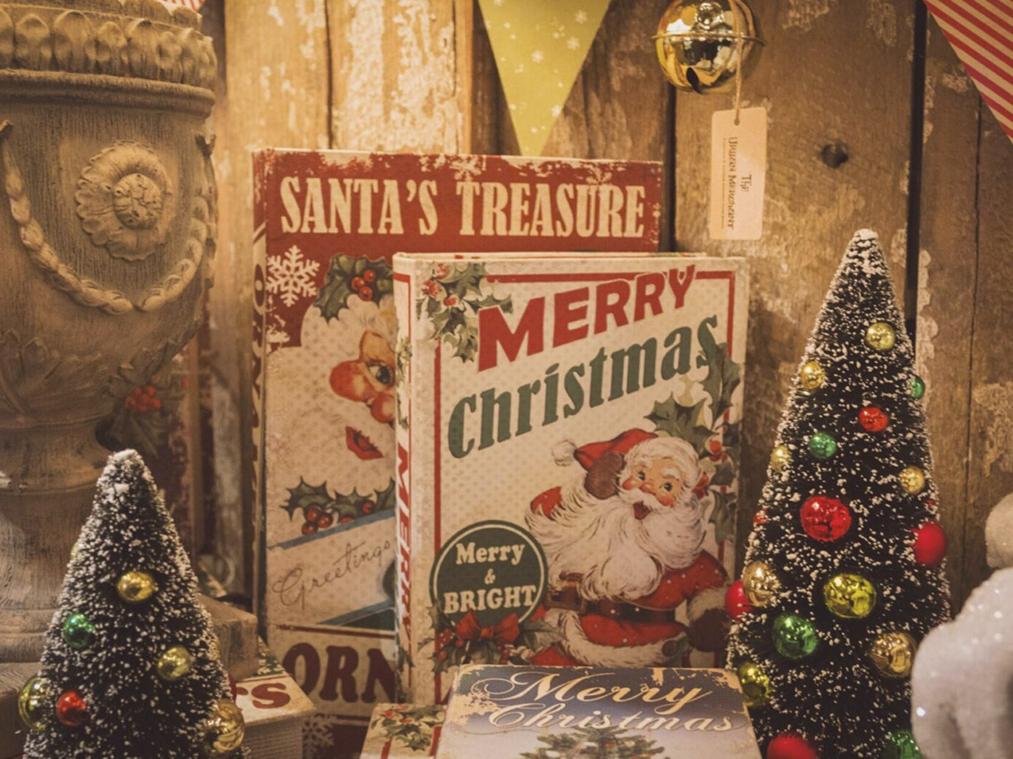 A christmas display of santa 's treasure and merry christmas.