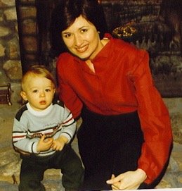 A woman and child pose for the camera.