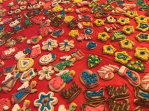 A table covered with lots of cookies on it.
