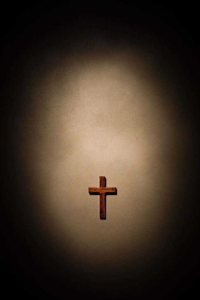 A cross is shown in the middle of a room.