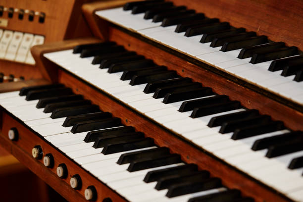 A close up of the keys on an organ