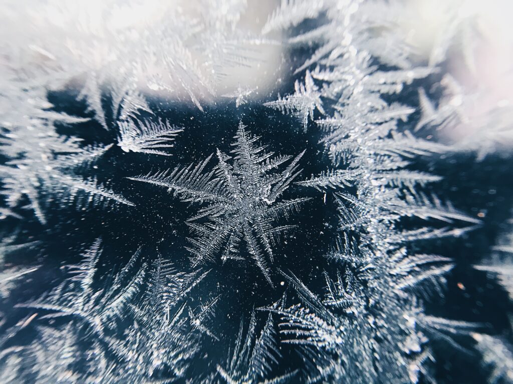A close up of the ice crystals on a window.