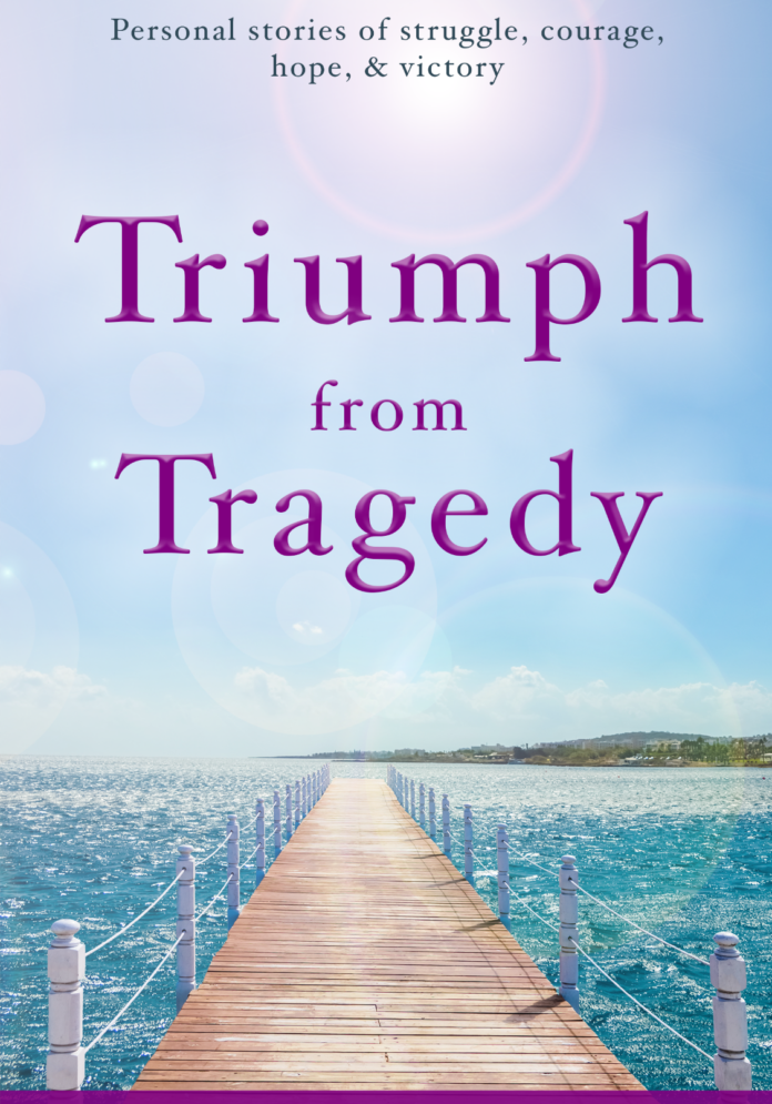 A pier with the words triumph from tragedy written on it.